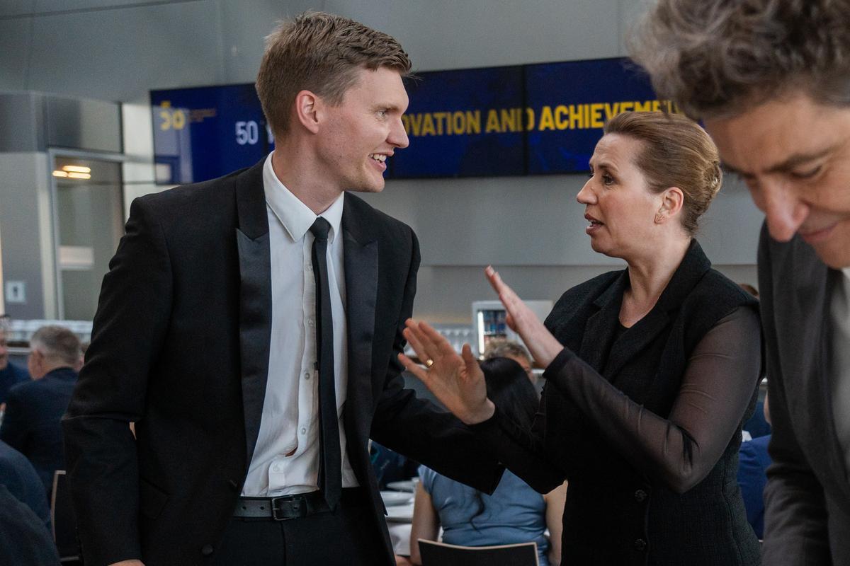Prime Minister Mette Frederiksen greets the Social Democratic mayor of Aalborg, Lasse Frimand Jensen